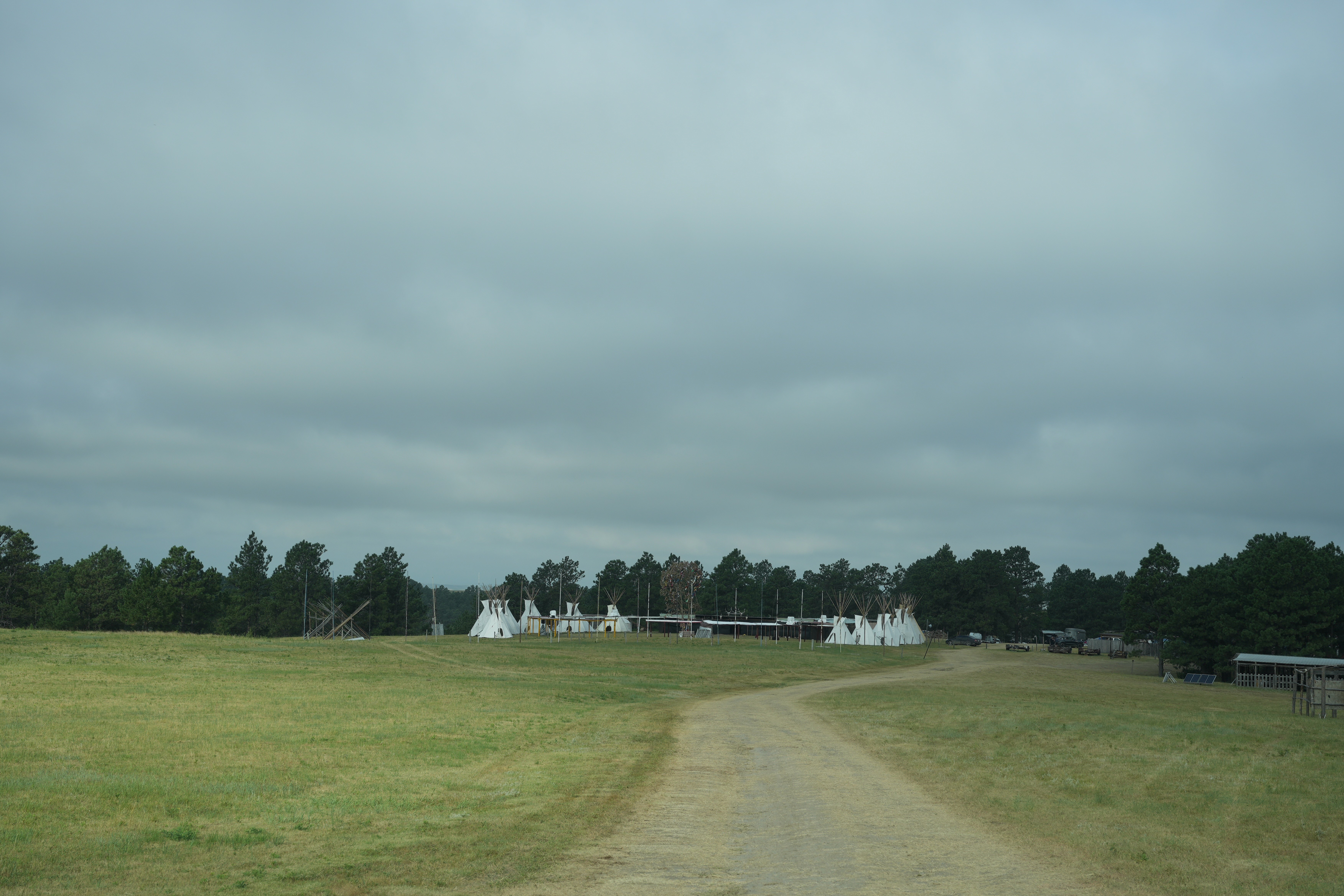 Sun Dance ceremonial grounds with tipis and sacred structures